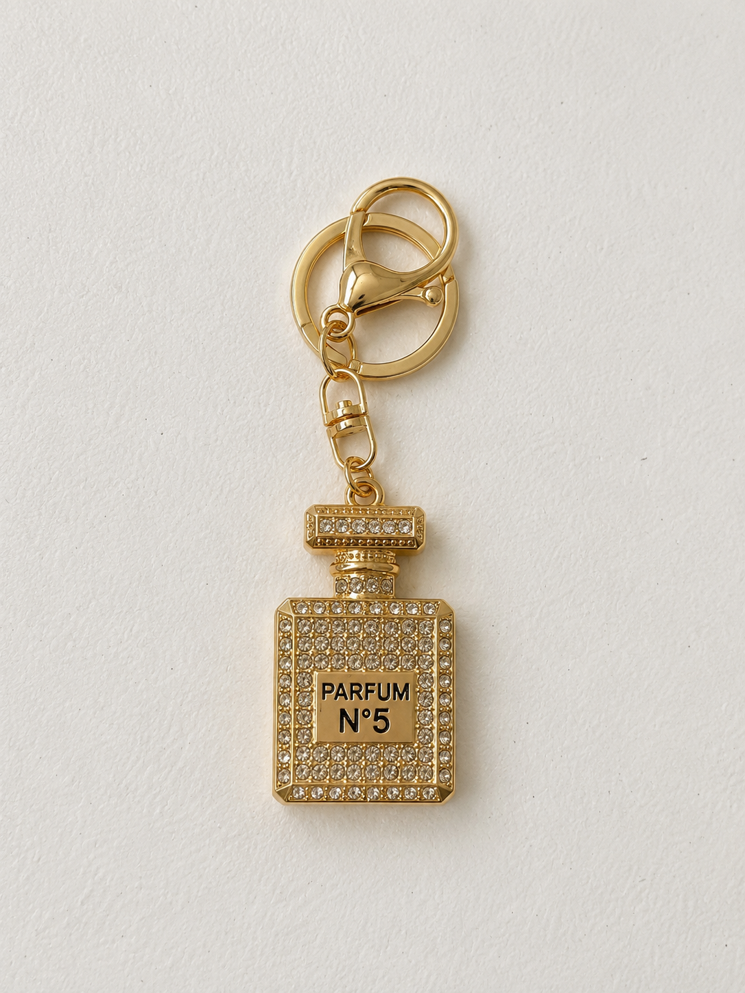 Porte-clés flacon de parfum – Couleurs variées