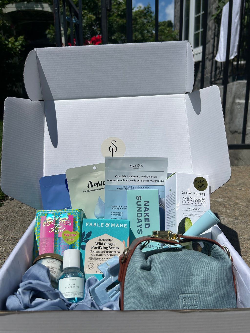 Self love box Denim-B - self-care gift box with denim handbag, skincare, makeup and hair accessories from Anastasia Beverly Hills, Fenty Beauty and more